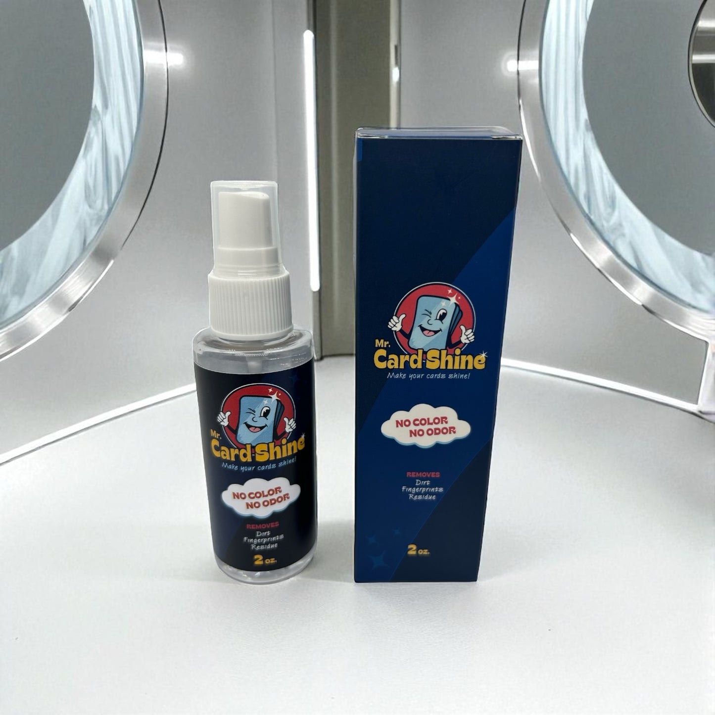 Mr. Card Shine spray bottle and packaging on a reflective surface with circular designs.