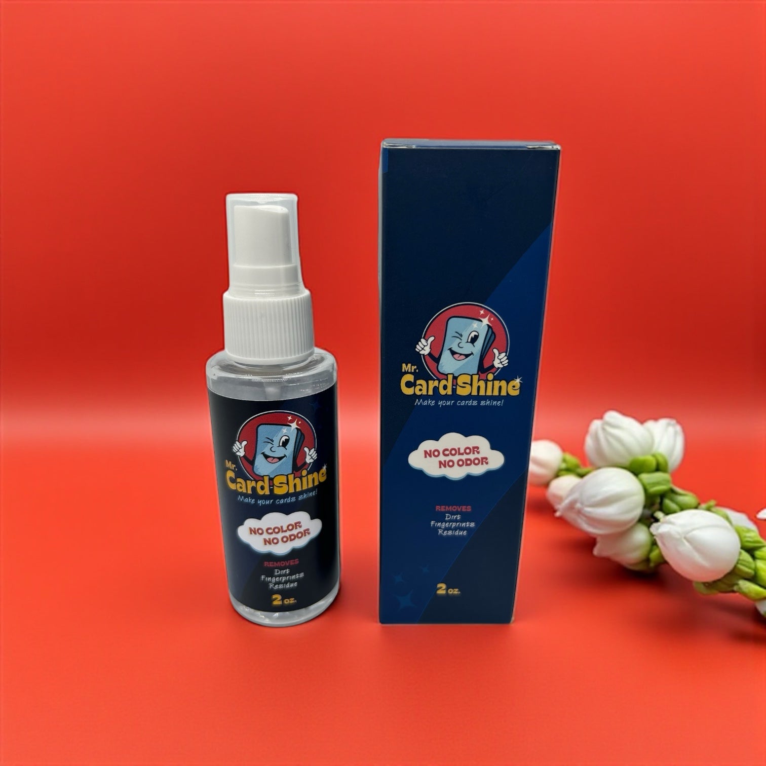 Mr. Card Shine spray bottle and packaging on a red background with white flowers.